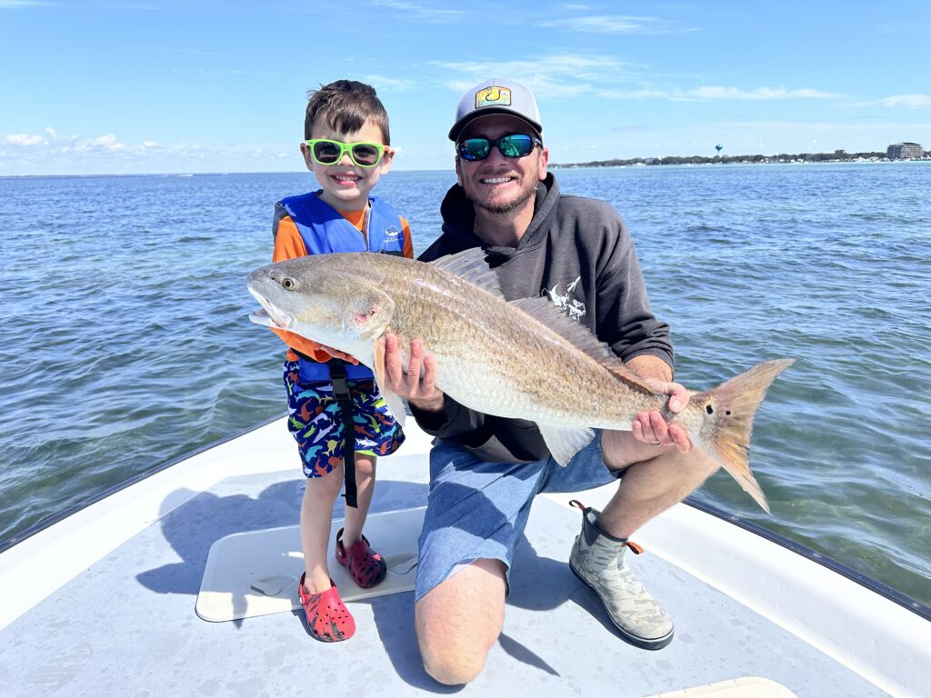 Captain Nick Kirby with a Redfish